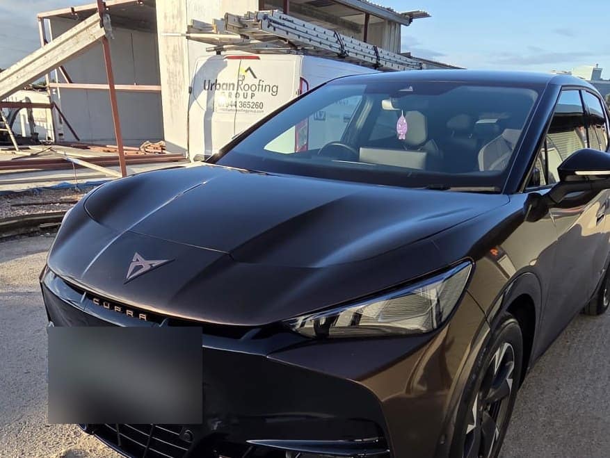 A Cupra Born wrapped in a bronze colour-change film