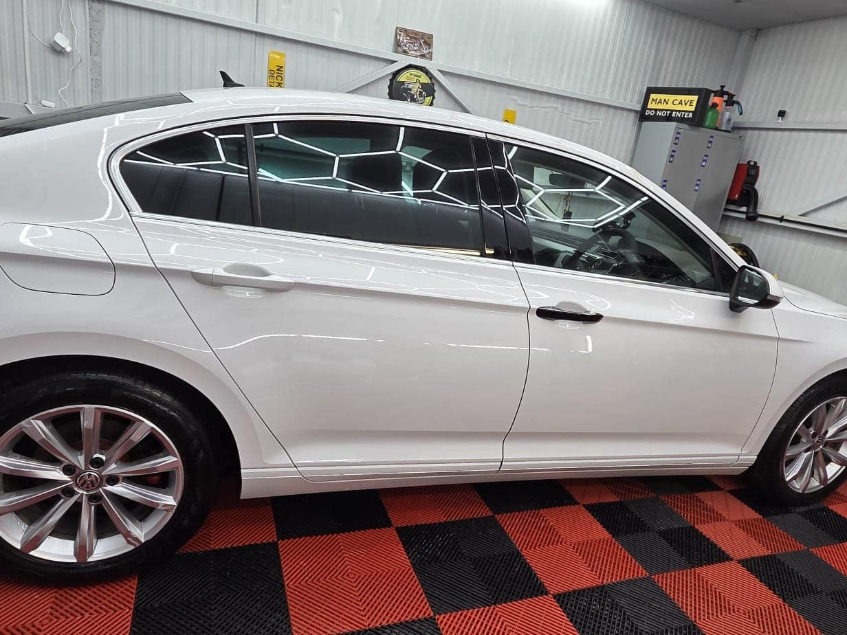 A white Hyundai i40 after its decontamination and valet, in the Connah's Quay studio